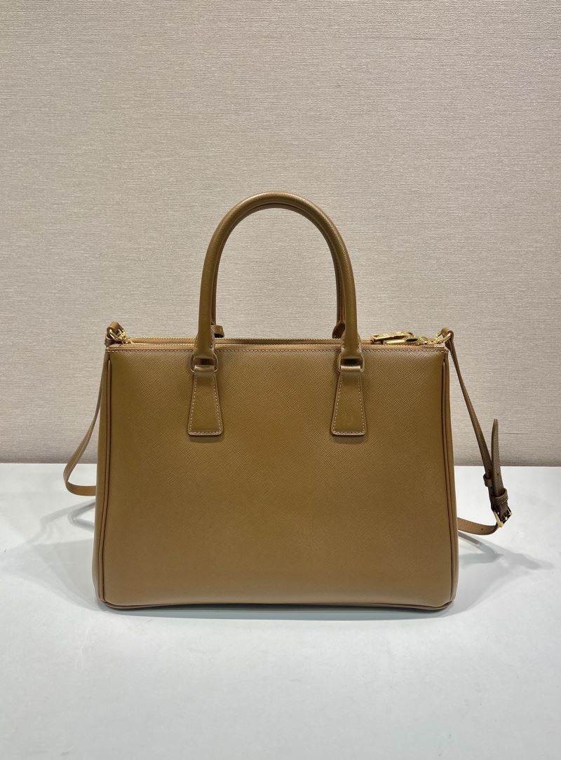 Pra*a top handle bags